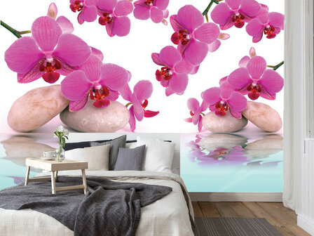 Orchidee&euml;n met witte stenen fotobehang