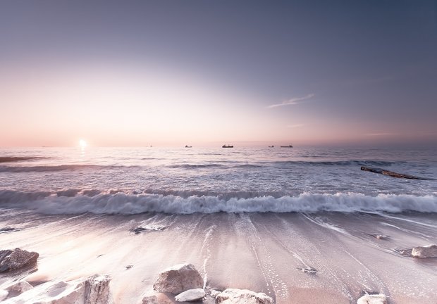 Strand fotobehang Zonsondergang