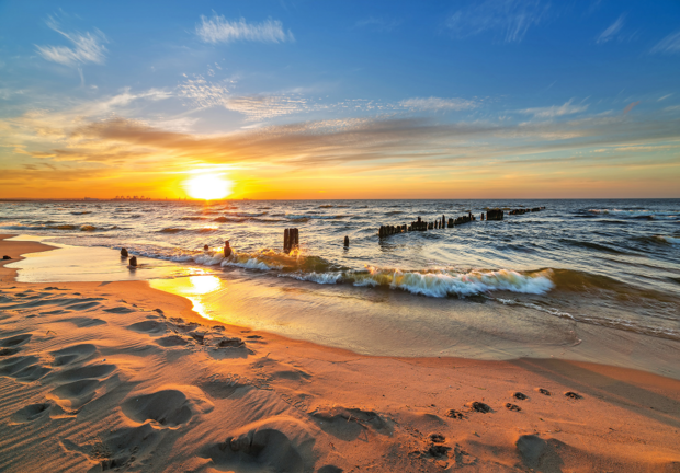 Strand en zonsondergang fotobehang