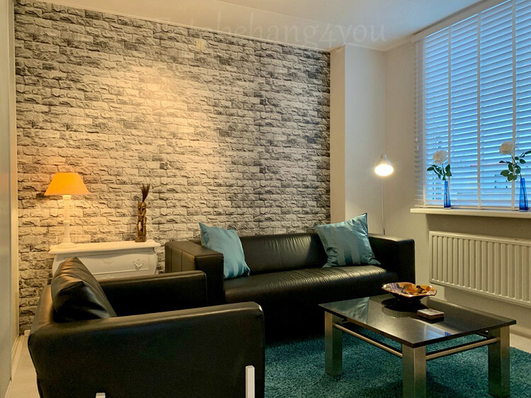 Net een echt stenen muur. Ben er blij mee!